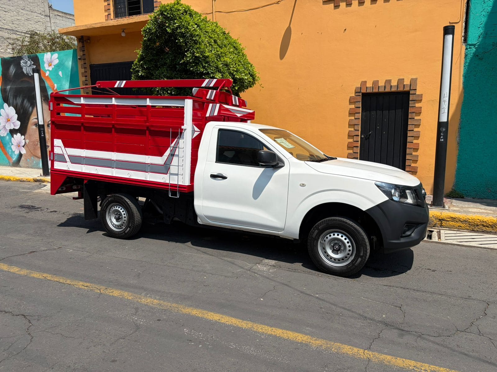 1 Nissan NP300 Estacas 2019